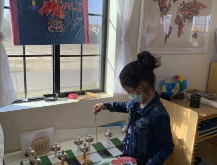 Elementary Montessori Student Learning How to Think In Montessori Elementary School