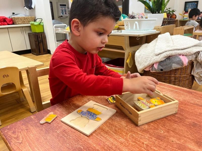 Toddler learning math at Lifetime Montessori School in San Diego