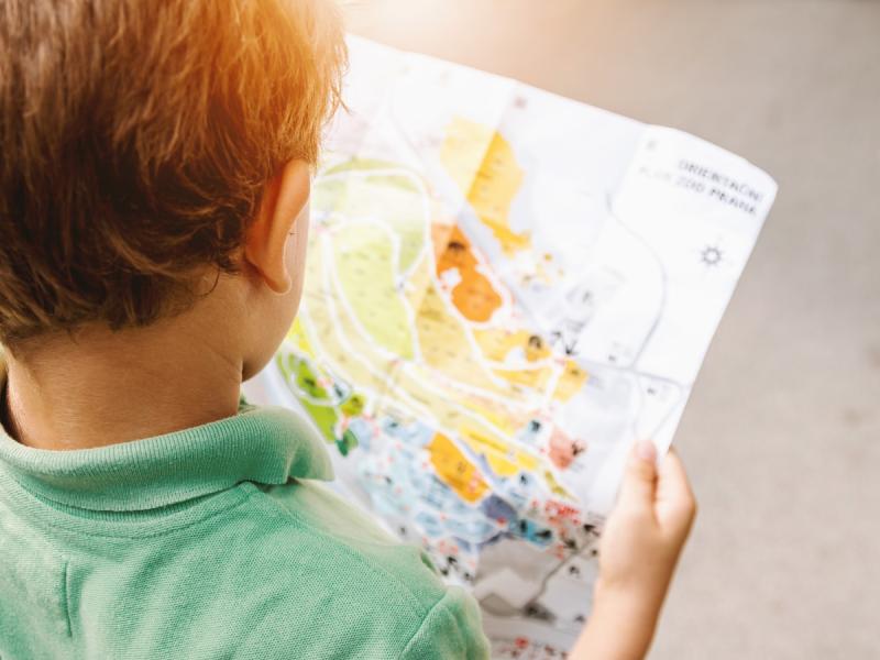 Boy holding a map