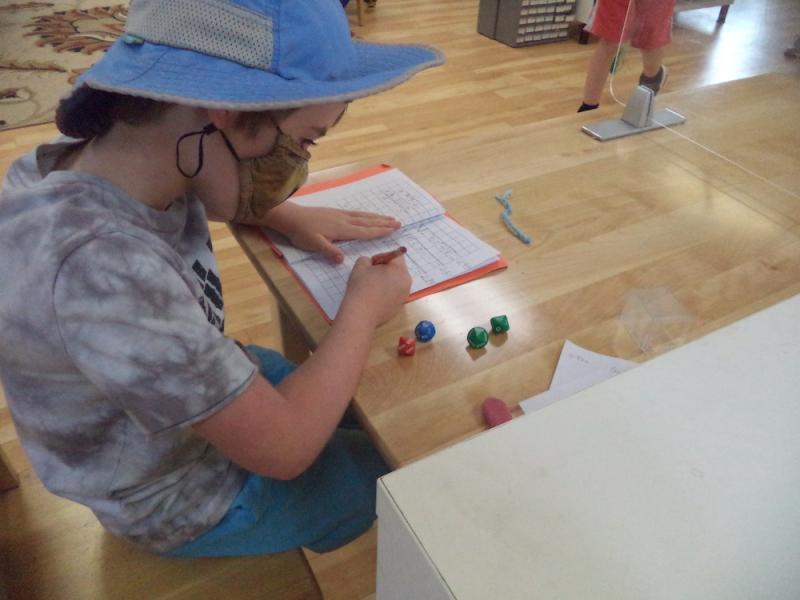 Independent Elementary child in a Montessori classroom in San Diego