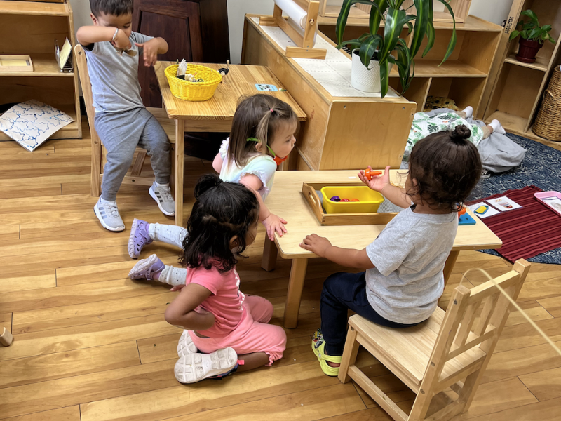 Children working independently in a Montessori Classroom in San Diego