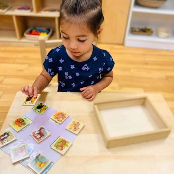 Toddler independently working on art at Lifetime Montessori School 