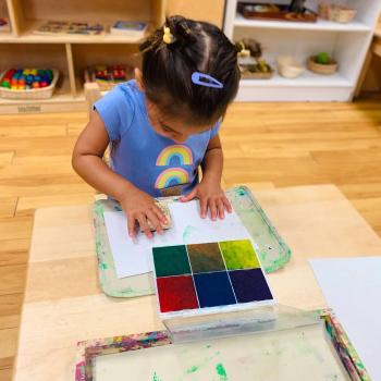 Toddler independently working on art at Lifetime Montessori School 
