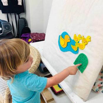 Toddler independently working on art at Lifetime Montessori School 