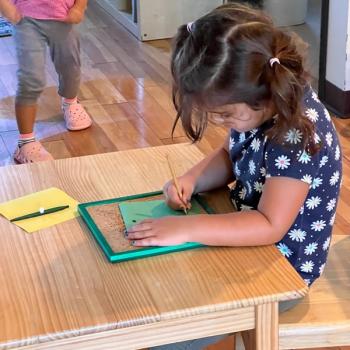 montessori primary child working at Lifetime Montessori School in San Diego