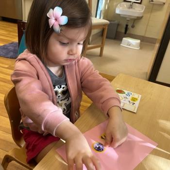 Toddler independently working on art at Lifetime Montessori School 