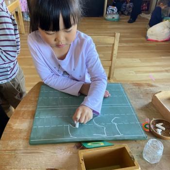 montessori primary child working at Lifetime Montessori School in San Diego