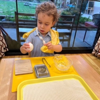 Montessori primary child working at Lifetime Montessori School in San Diego